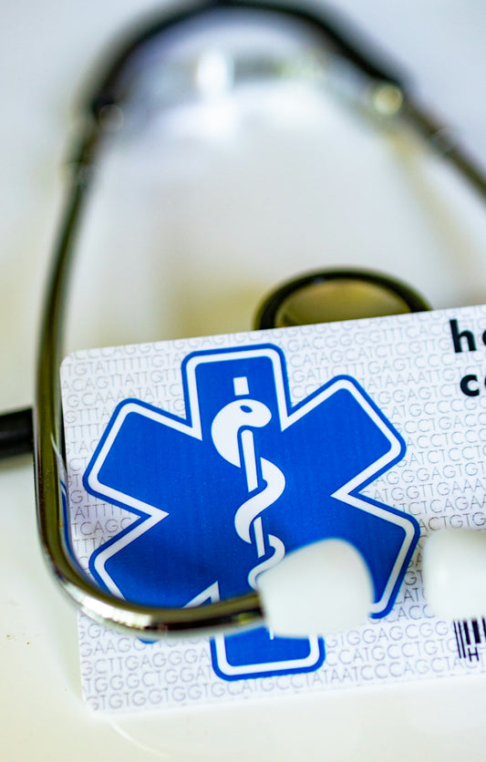 A card with a medical symbol on it